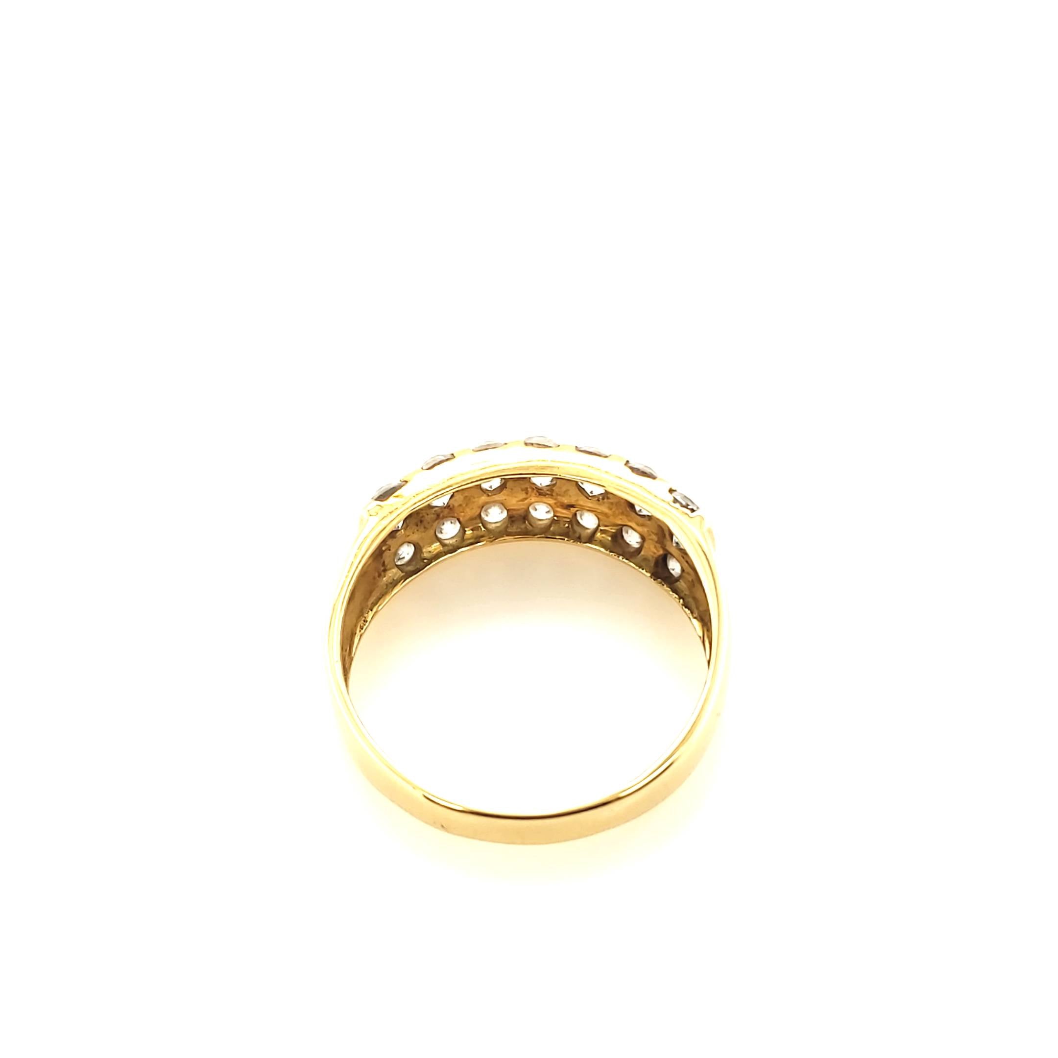 Damenring Gelbgold 750 mit farblosen Steinen Gr.57