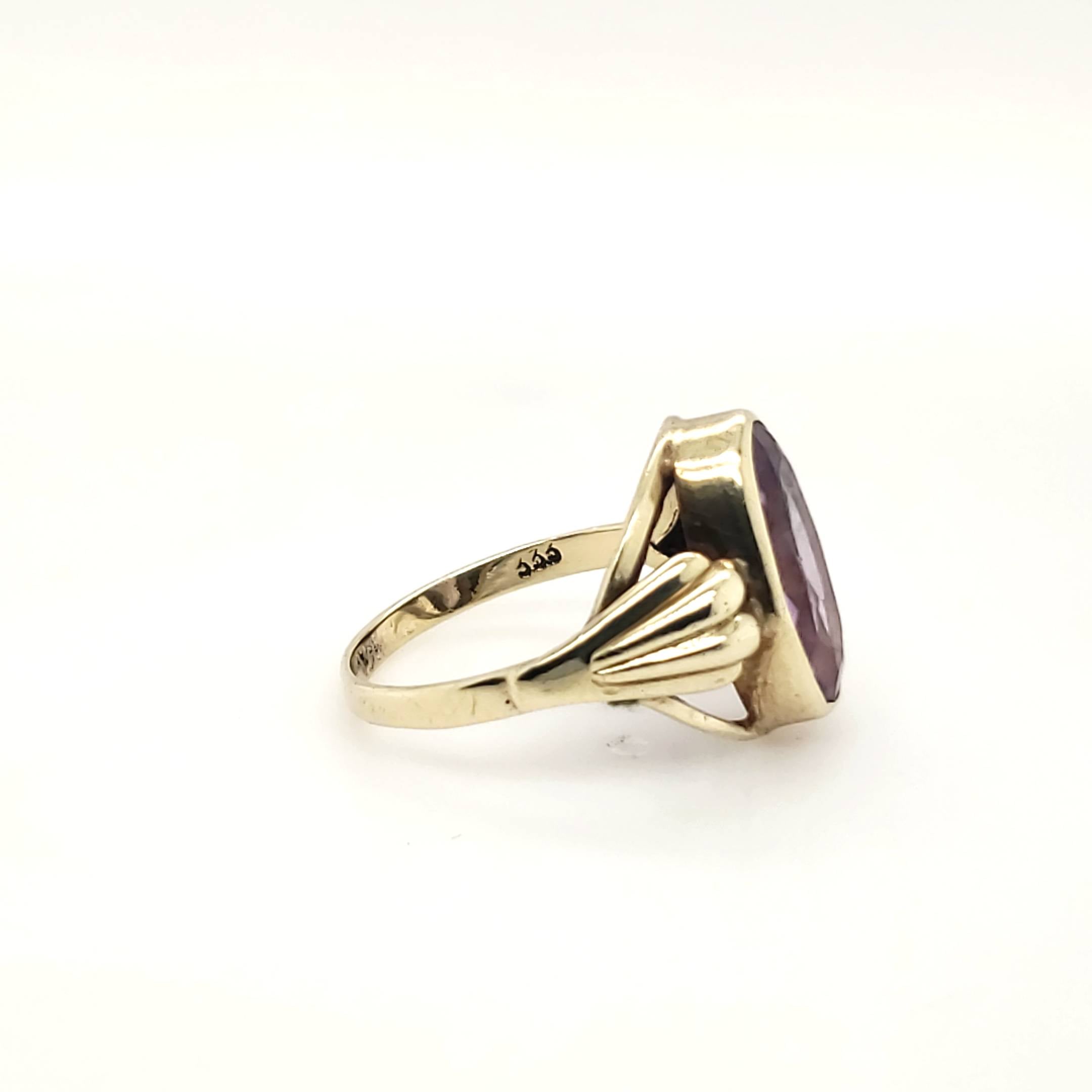 Ring Gelbgold 333 Schmuckstein Lila Größe 53
