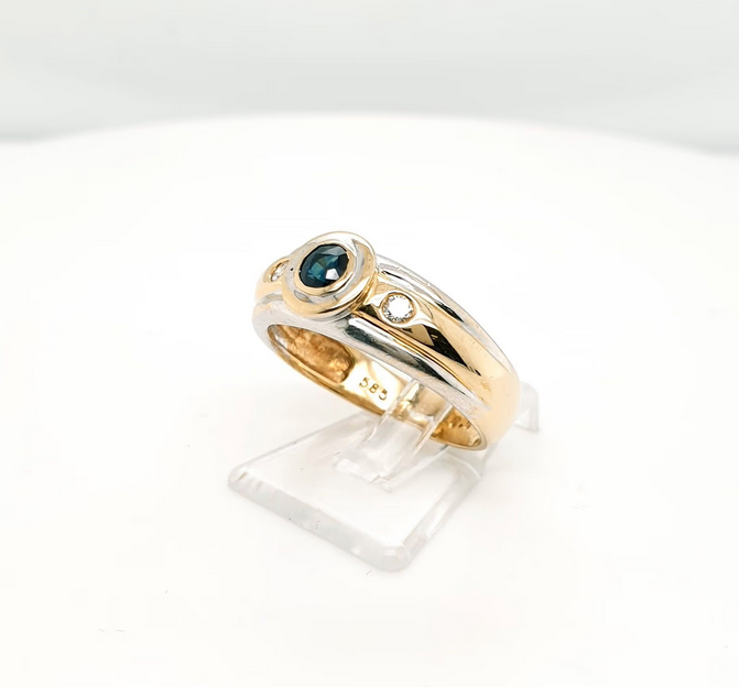 Brillantring mit einem Onyx aus Weiß- und Gelbgold - 585er Gr. 54
