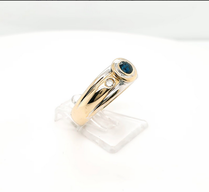 Brillantring mit einem Onyx aus Weiß- und Gelbgold - 585er Gr. 54